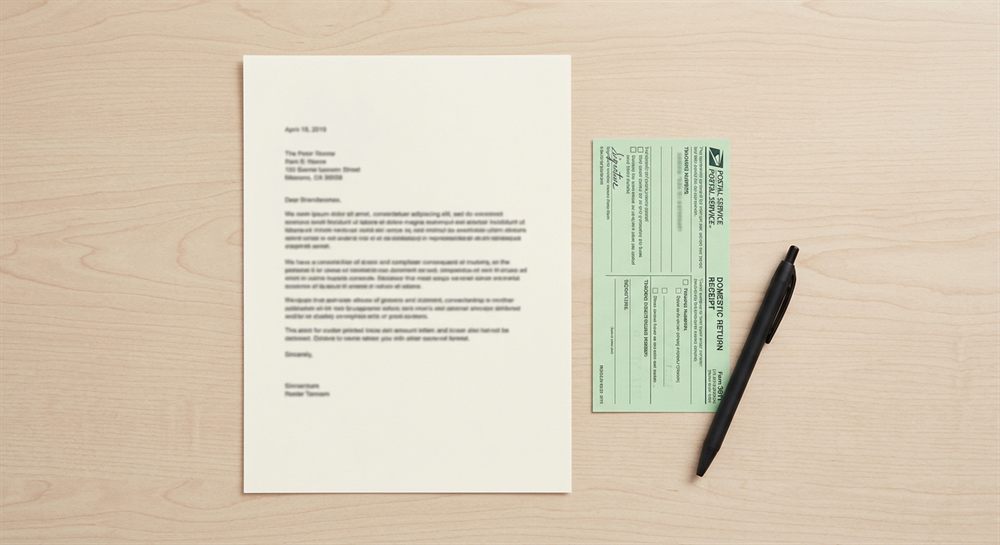 Printed debt validation letter with a certified mail return receipt card